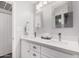 Modern bathroom with double sinks, quartz countertops, and elegant mirrors, offering a spa-like experience at 6480 N 82Nd St # 1136, Scottsdale, AZ 85250