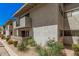 Well-maintained exterior of a condo building with desert landscaping, adding curb appeal to the property at 6480 N 82Nd St # 1136, Scottsdale, AZ 85250
