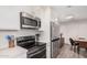 Well-equipped kitchen with stainless steel appliances and ample counter space for cooking at 6480 N 82Nd St # 1136, Scottsdale, AZ 85250
