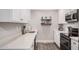 Efficient kitchen layout offers modern appliances and storage solutions with bright lighting at 6480 N 82Nd St # 1136, Scottsdale, AZ 85250