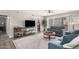 Bright living room with cozy seating, modern rug, and easy access to outdoor space at 6480 N 82Nd St # 1136, Scottsdale, AZ 85250