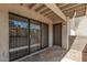 Outdoor patio space with sliding glass doors, offering a seamless transition between indoor and outdoor living at 6480 N 82Nd St # 1136, Scottsdale, AZ 85250