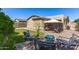 Landscaped backyard featuring a brick patio, outdoor furniture, and gazebo at 6620 S 16Th Dr, Phoenix, AZ 85041