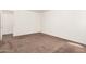 Carpeted bedroom with neutral walls and a window at 6620 S 16Th Dr, Phoenix, AZ 85041