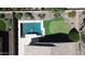 Aerial view showcases backyard pool and putting green of desert home at 7050 S Fawn Ave, Gilbert, AZ 85298
