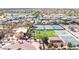 Overhead shot of the community center with tennis courts and verdant green sports fields at 7050 S Fawn Ave, Gilbert, AZ 85298