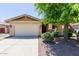 Charming single-story home featuring a well-maintained yard and attached two-car garage in a desirable neighborhood at 7050 S Fawn Ave, Gilbert, AZ 85298