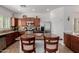 Modern kitchen with stainless steel appliances, kitchen island with bar seating at 7050 S Fawn Ave, Gilbert, AZ 85298