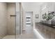 Modern bathroom with a glass-enclosed shower and stylish vanity, creating a spa-like experience with clean lines at 7180 E Kierland Blvd # 811, Scottsdale, AZ 85254