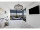 Stylish bedroom featuring a comfortable daybed, a surfboard and expansive city views, offering a unique and airy ambiance at 7180 E Kierland Blvd # 811, Scottsdale, AZ 85254