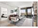 Comfortable living room with stylish decor and a door leading to the bedroom at 7180 E Kierland Blvd # 811, Scottsdale, AZ 85254