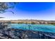 Rooftop pool with comfortable lounge chairs and stunning city views at 7180 E Kierland Blvd # 811, Scottsdale, AZ 85254