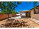 View of backyard with a covered patio and block fencing at 7360 N 38Th Dr, Phoenix, AZ 85051