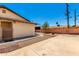 View of backyard showing concrete patio and block wall at 7360 N 38Th Dr, Phoenix, AZ 85051