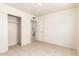 Bedroom featuring tile floors, closet, and attached bathroom at 7360 N 38Th Dr, Phoenix, AZ 85051