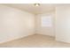Bright bedroom with tile flooring and natural light from window at 7360 N 38Th Dr, Phoenix, AZ 85051