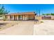 Inviting single-story home with a covered carport and spacious driveway at 7360 N 38Th Dr, Phoenix, AZ 85051