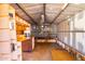 Shed interior features shelving and workbench space at 7360 N 38Th Dr, Phoenix, AZ 85051