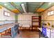 Shed interior with a workbench and open shelving at 7360 N 38Th Dr, Phoenix, AZ 85051