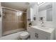 Updated bathroom featuring a shower with glass doors, modern vanity, and stylish fixtures at 7430 E Chaparral Rd # A222, Scottsdale, AZ 85250