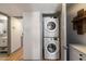 Convenient in-unit laundry area featuring a stackable washer and dryer at 7430 E Chaparral Rd # A222, Scottsdale, AZ 85250