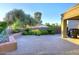 Backyard featuring a brick paver patio, a grill, and lush landscaping at 7596 N Via De La Siesta --, Scottsdale, AZ 85258