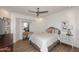 Cozy bedroom with hardwood floors, ceiling fan and a built-in desk at 7596 N Via De La Siesta --, Scottsdale, AZ 85258