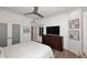 Bedroom featuring hardwood floors, ceiling fan and a large bureau at 7596 N Via De La Siesta --, Scottsdale, AZ 85258