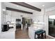 Bright modern kitchen featuring stainless steel appliances, white cabinetry, and a center island with seating at 7596 N Via De La Siesta --, Scottsdale, AZ 85258