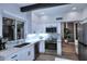 Bright kitchen with white cabinets, stainless steel appliances, light backsplash, and convenient breakfast bar at 7596 N Via De La Siesta --, Scottsdale, AZ 85258
