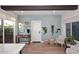 Open-concept living area featuring wood-look flooring and view to the patio at 7596 N Via De La Siesta --, Scottsdale, AZ 85258