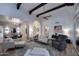 Open-concept living room featuring a modern design, wood-look flooring, and natural light throughout at 7596 N Via De La Siesta --, Scottsdale, AZ 85258