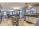 Open kitchen with granite countertops, stainless steel appliances, and seamless flow to living spaces at 838 E Nolan Pl, Chandler, AZ 85249
