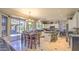 View of the kitchen and breakfast area with sliding glass doors to the backyard at 838 E Nolan Pl, Chandler, AZ 85249