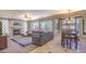 Spacious living room with a fireplace, large sectional sofa, and lots of natural light at 838 E Nolan Pl, Chandler, AZ 85249