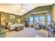 Spacious main bedroom features a large bay window and a decorative ceiling fan for comfort and style at 838 E Nolan Pl, Chandler, AZ 85249