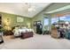 Spacious main bedroom features a large bay window and a decorative ceiling fan for comfort and style at 838 E Nolan Pl, Chandler, AZ 85249