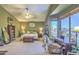 Spacious main bedroom features a large bay window and a decorative ceiling fan for comfort and style at 838 E Nolan Pl, Chandler, AZ 85249