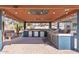 Inviting outdoor bar area with stainless grill, mini-fridges and spacious backyard at 838 E Nolan Pl, Chandler, AZ 85249