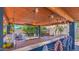 Inviting outdoor bar area with modern fixtures, lighting, and an amazing space for entertaining at 838 E Nolan Pl, Chandler, AZ 85249