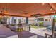Outdoor kitchen with stainless steel grill and spacious entertaining area with lighting at 838 E Nolan Pl, Chandler, AZ 85249