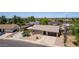 Aerial view of a single-Gathering home with a well-manicured lawn and a two-car garage at 846 N 81St St, Mesa, AZ 85207