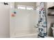 Bright bathroom with white subway tile and shower-tub combination at 846 N 81St St, Mesa, AZ 85207