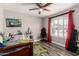 Bedroom with a ceiling fan, a window with shutters, and playful wall art at 846 N 81St St, Mesa, AZ 85207