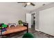 Bedroom featuring ceiling fan, plush gray carpet and a cozy bed at 846 N 81St St, Mesa, AZ 85207