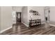 Inviting entryway featuring wood-look floors, a decorative front door, and ample space at 846 N 81St St, Mesa, AZ 85207