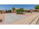 View of single-story home with mature landscaping, a two-car garage, and large driveway at 846 N 81St St, Mesa, AZ 85207