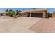 Single-story home featuring a two-car garage, desert landscaping, and a wide driveway at 846 N 81St St, Mesa, AZ 85207