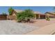 View of single-story home with mature landscaping, a two-car garage, and large driveway at 846 N 81St St, Mesa, AZ 85207