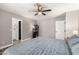 Spacious main bedroom with ensuite bath, closet, and wood floors, a ceiling fan at 846 N 81St St, Mesa, AZ 85207